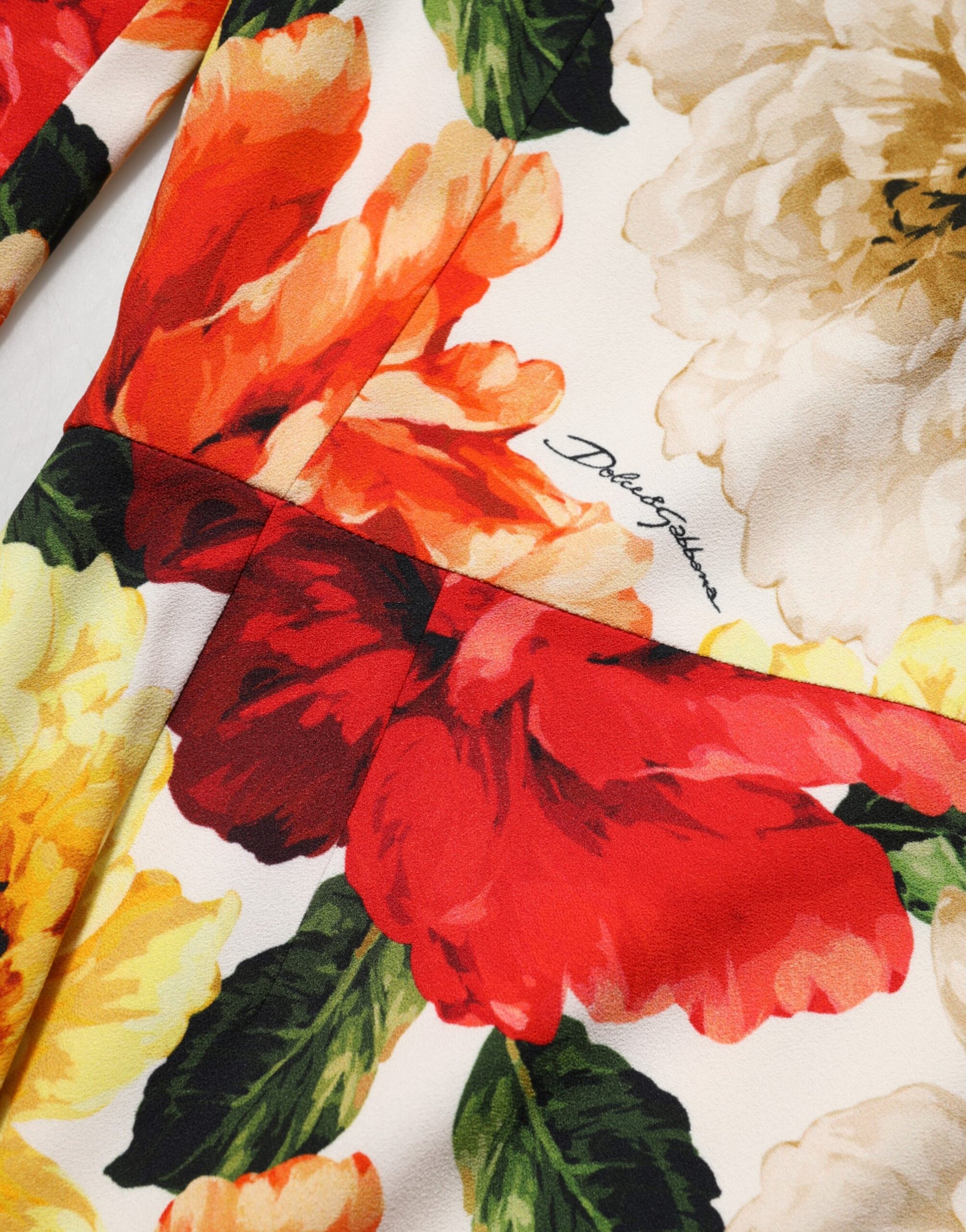 A multicolored floral print viscose sheath dress by Dolce & Gabbana