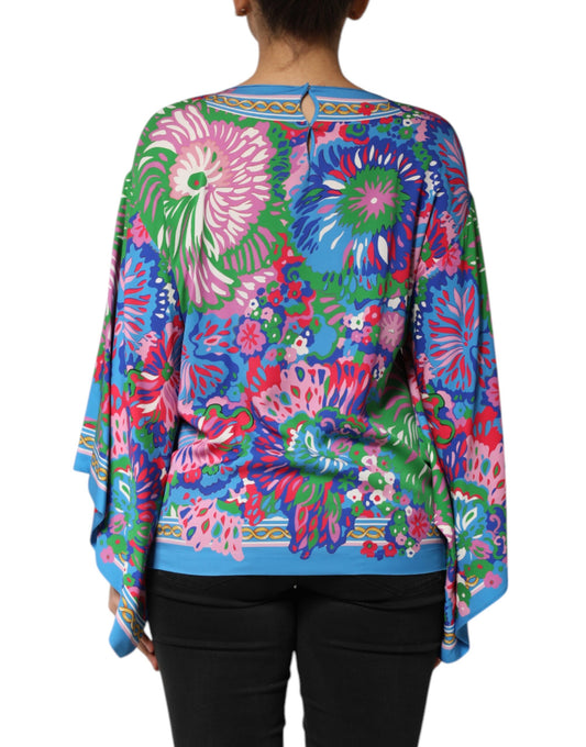 Colorful floral patterned shawl or sweater worn by a person