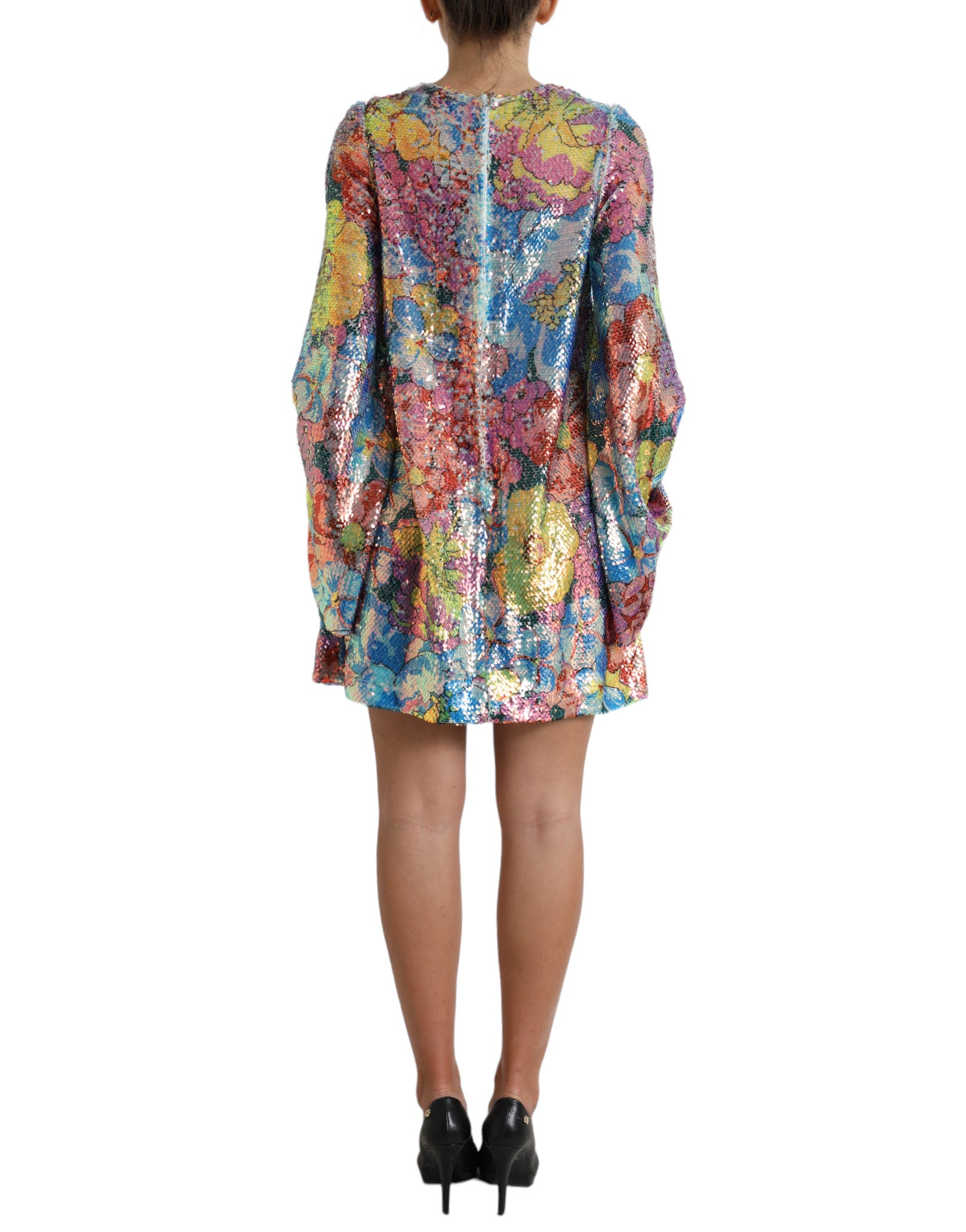 A colorful, sequined mini dress with floral pattern