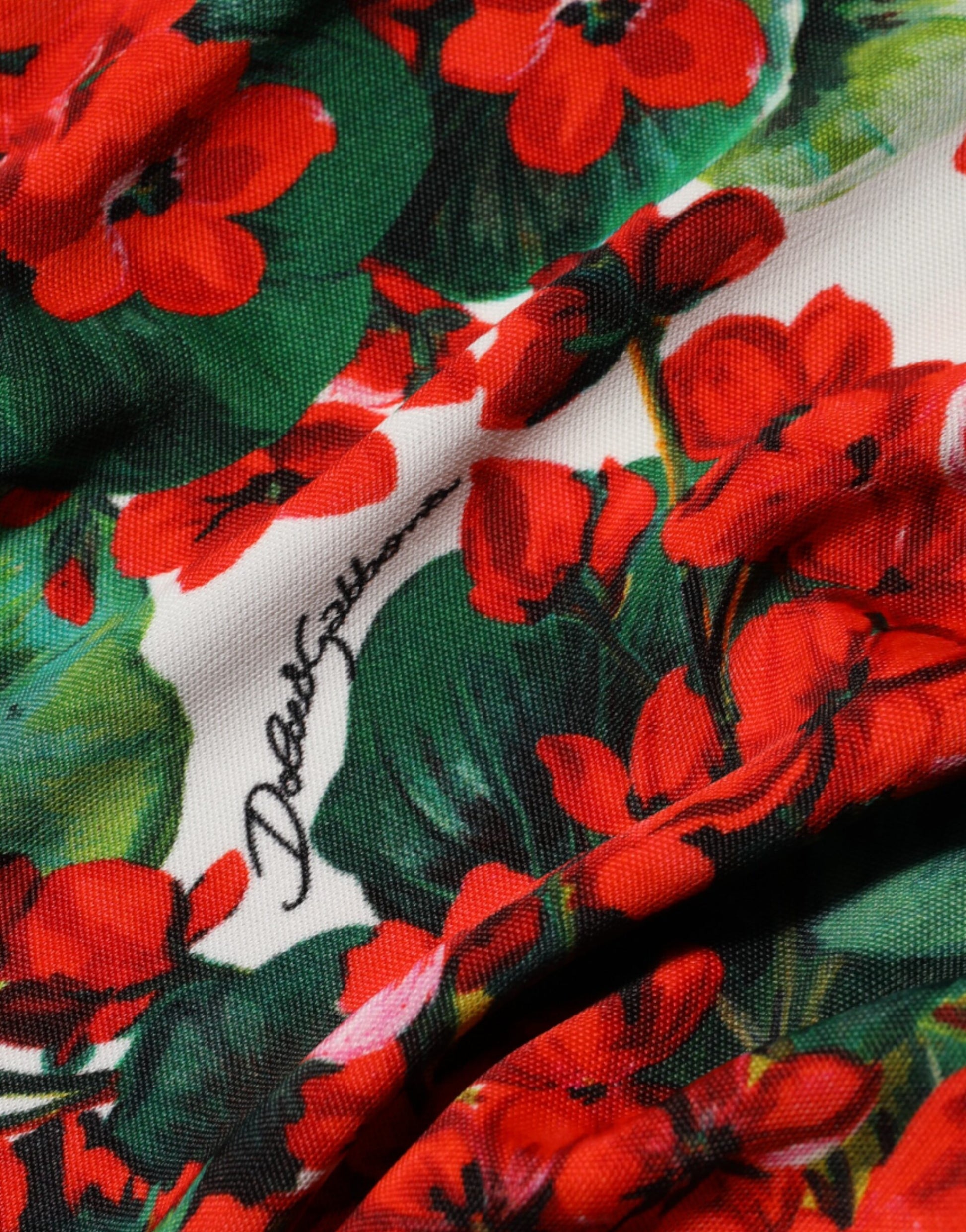 Red floral patterned fabric with white background
