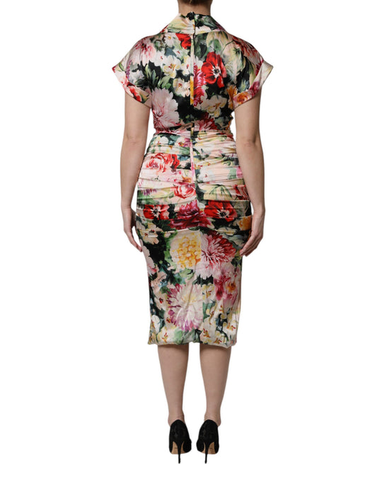 A woman's midi dress with floral print and short sleeves