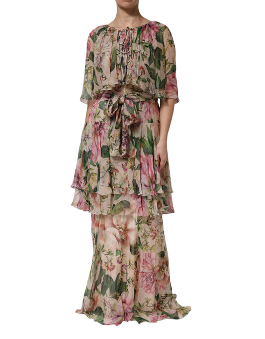 A long, layered maxi dress with a floral print in shades of pink and green