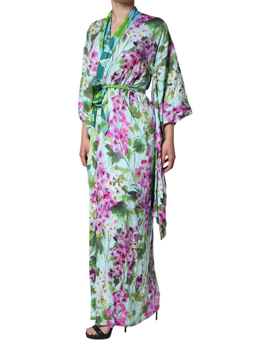 A long, floral print silk wrap dress with a green and pink color scheme