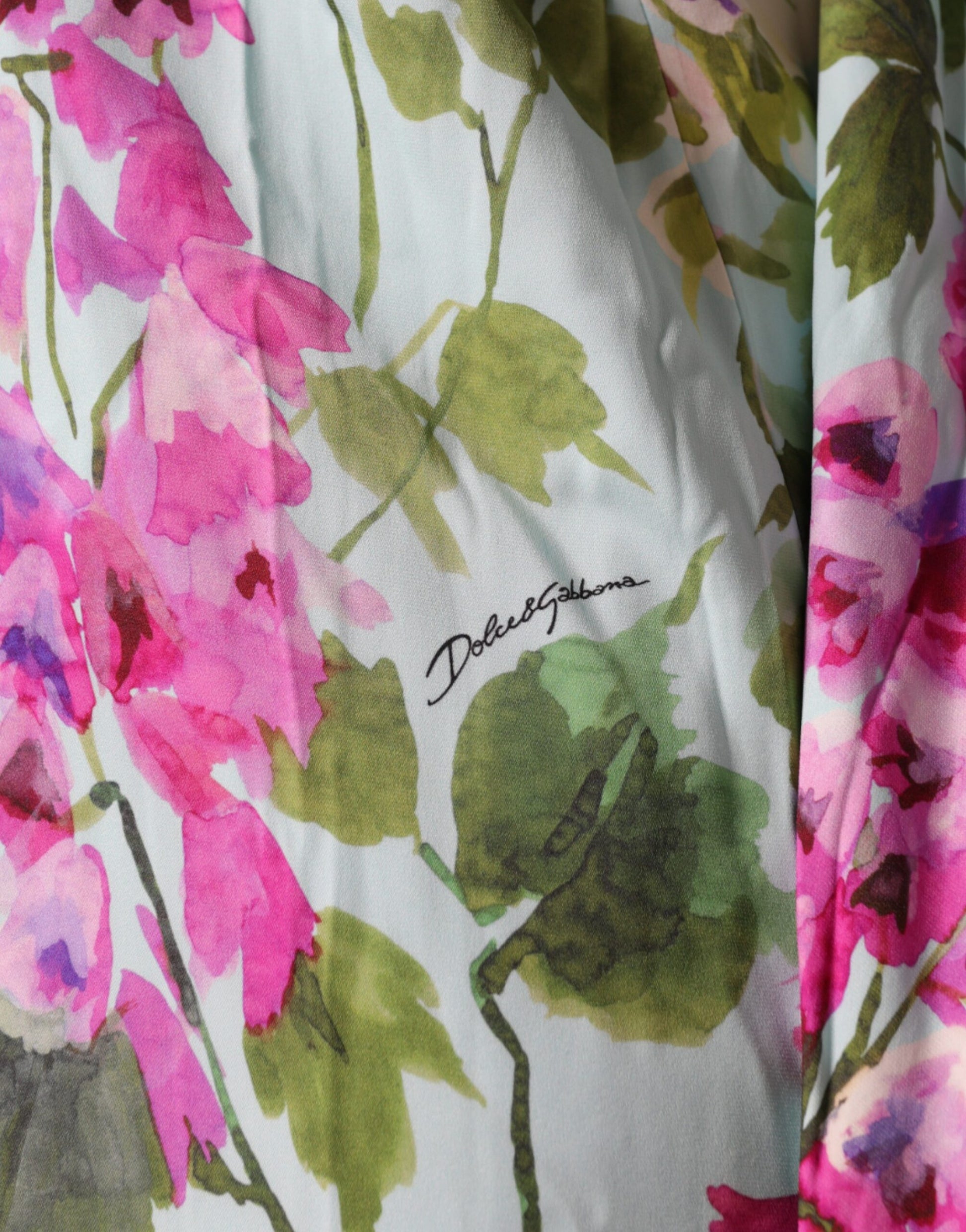 A multicolored floral silk stretch wrap dress by Dolce & Gabbana
