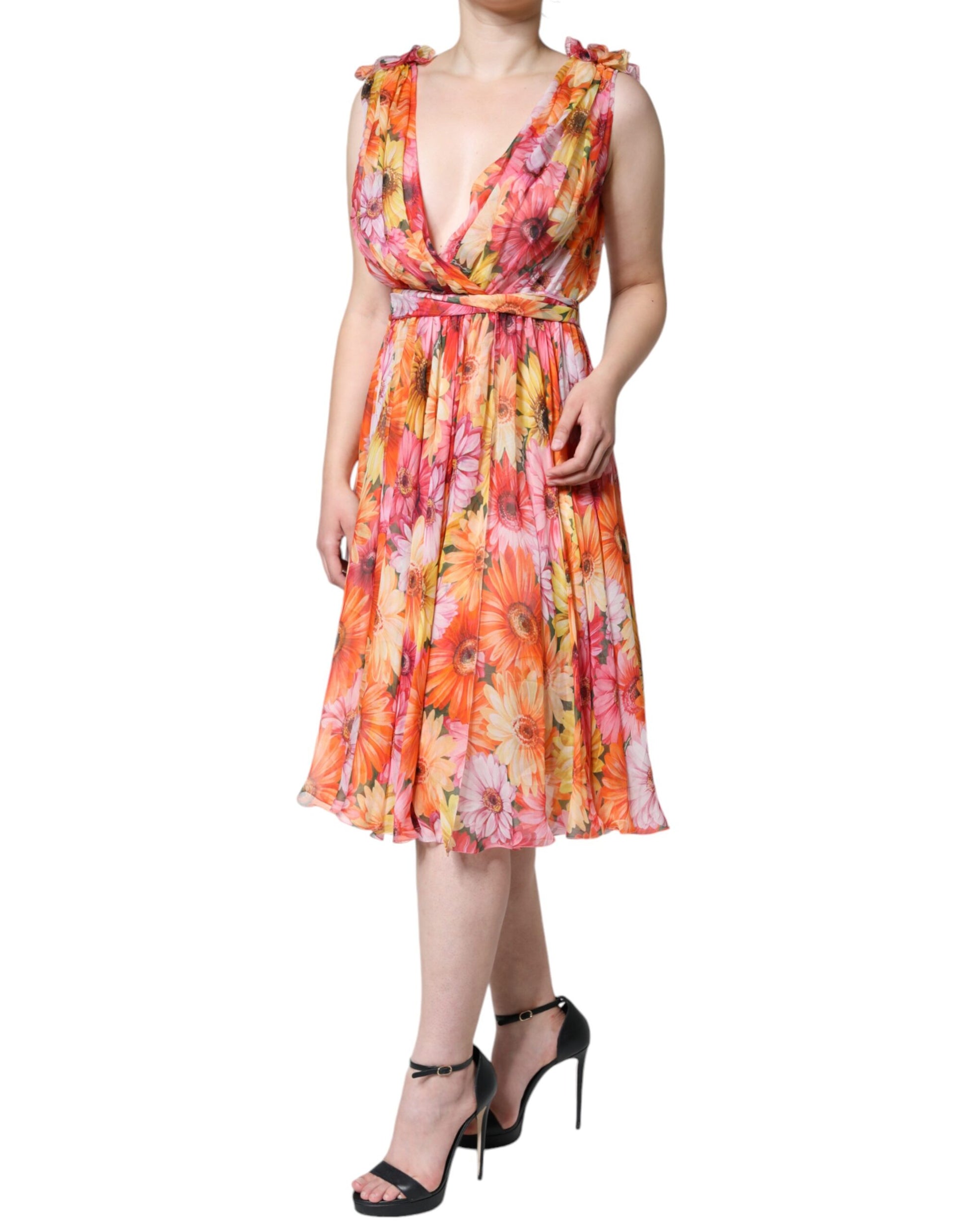 A sleeveless midi dress with a floral pattern