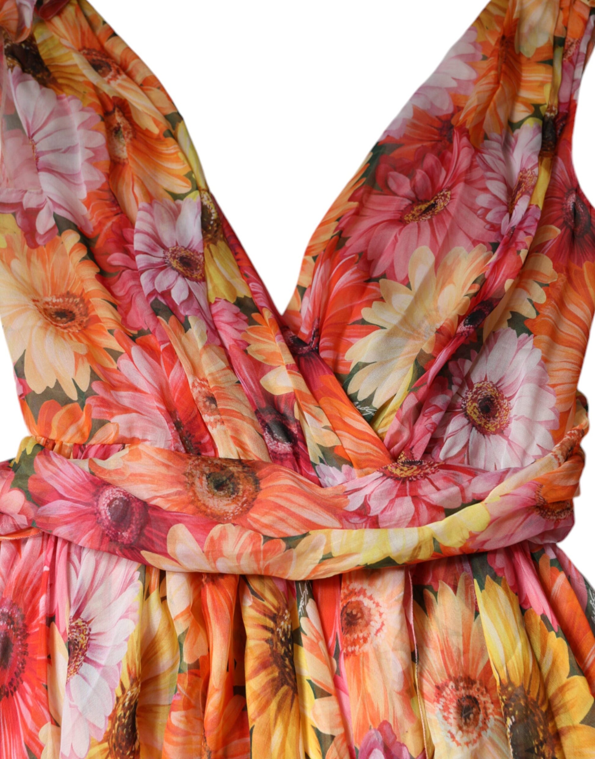 A sleeveless midi dress with a floral pattern