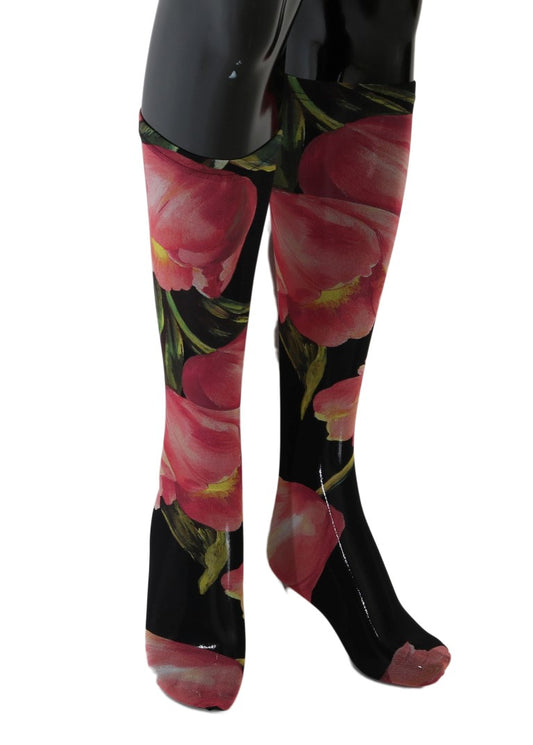 Tall black boots with floral print on legs