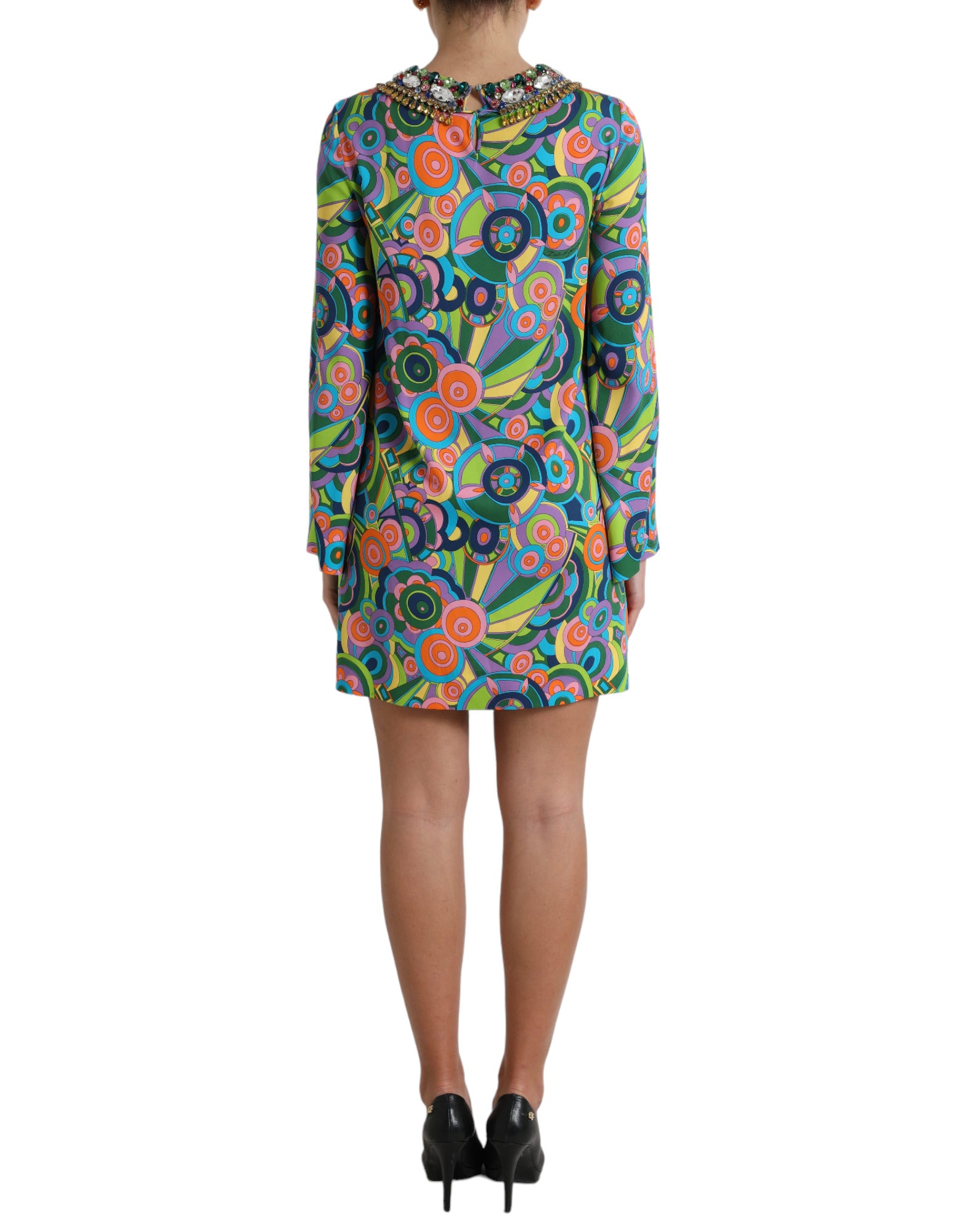 A colorful midi dress with a geometric print and crystal embellishments