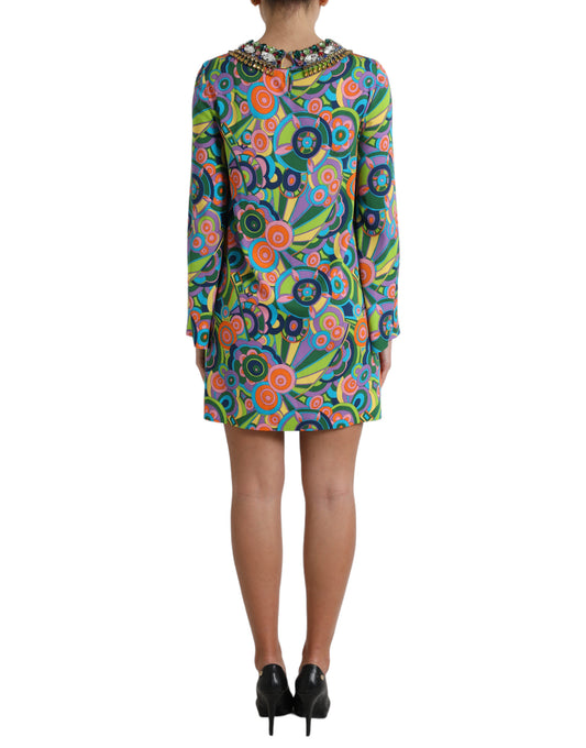 A colorful midi dress with a geometric print and crystal embellishments