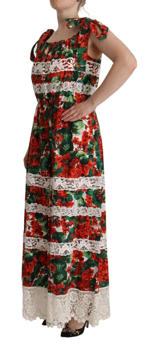 A long, multicolored dress with a geranium print and lace detailing