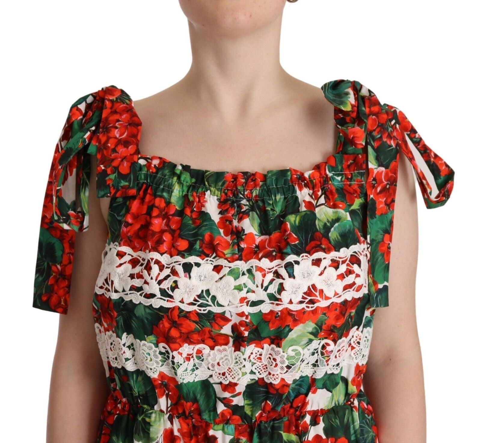 A red, green, white, and black lace long maxi dress with a geranium print
