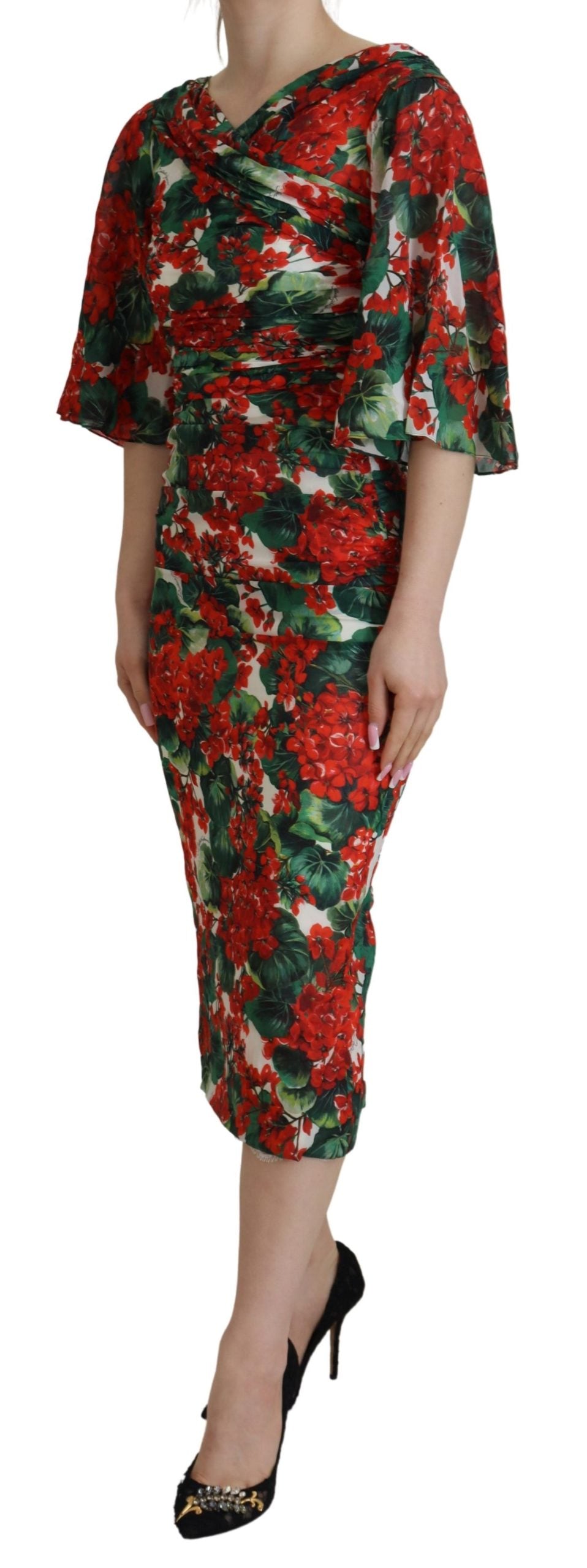 A midi dress with a floral pattern and sheer sleeves, in silk