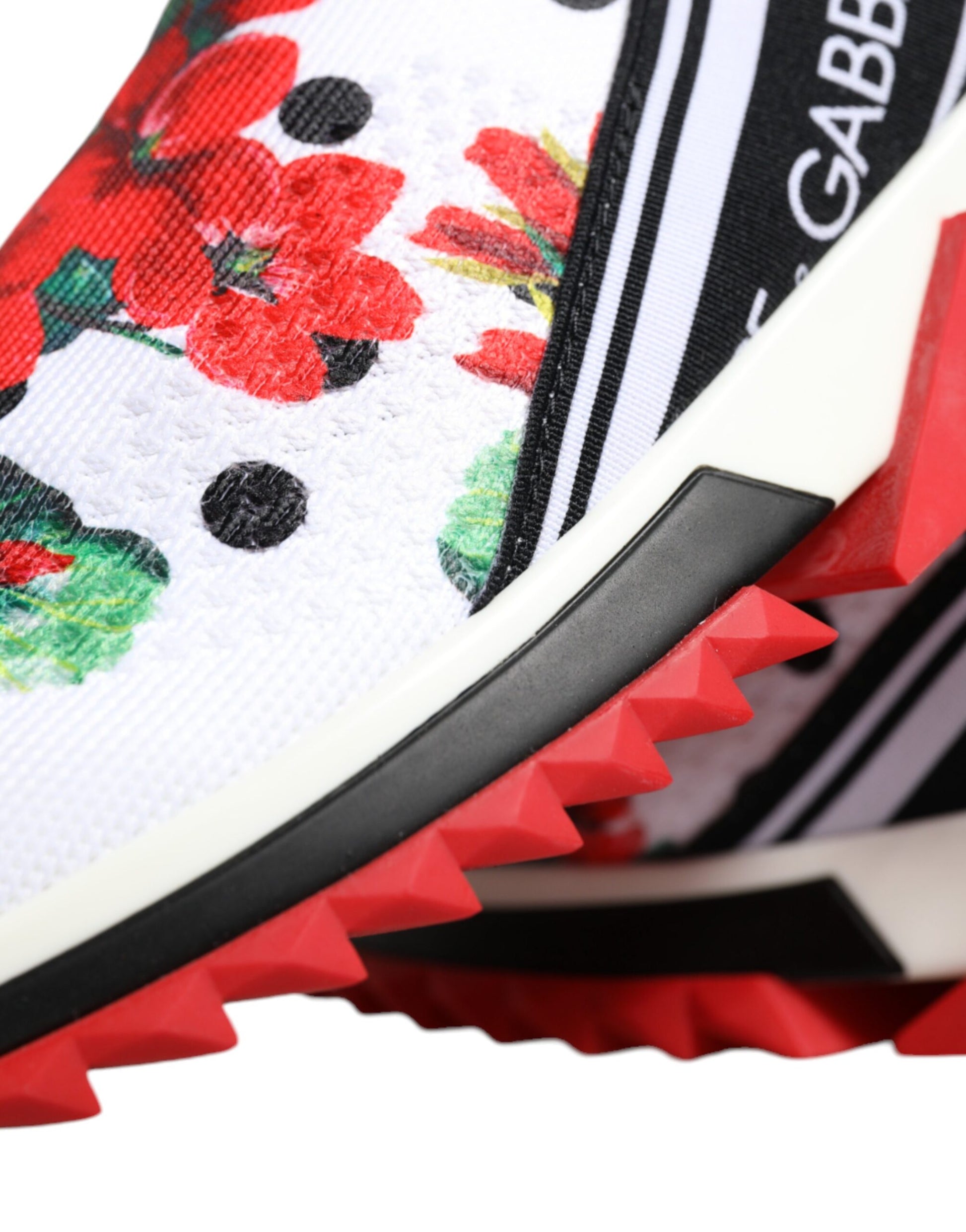 Red and white sneaker with floral pattern on side