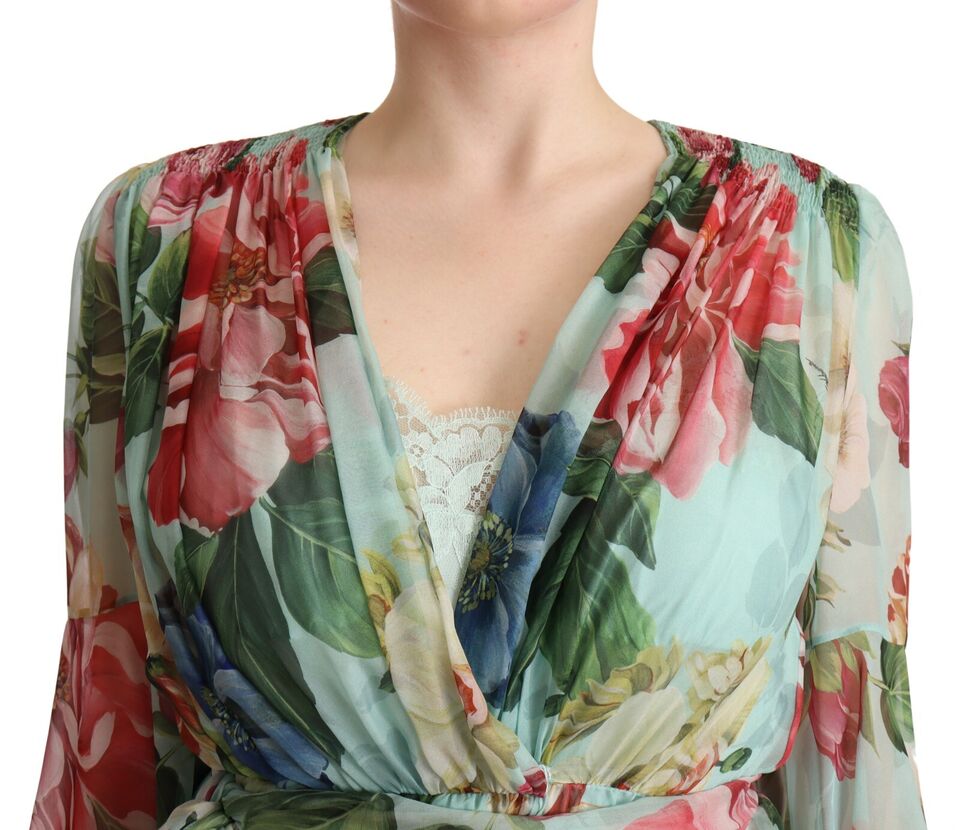 A woman's floral print midi dress with a wrap style and silk fabric