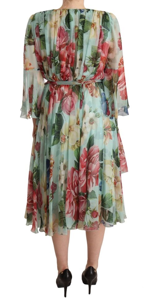 A midi dress with a floral pattern and wrap style, in silk fabric