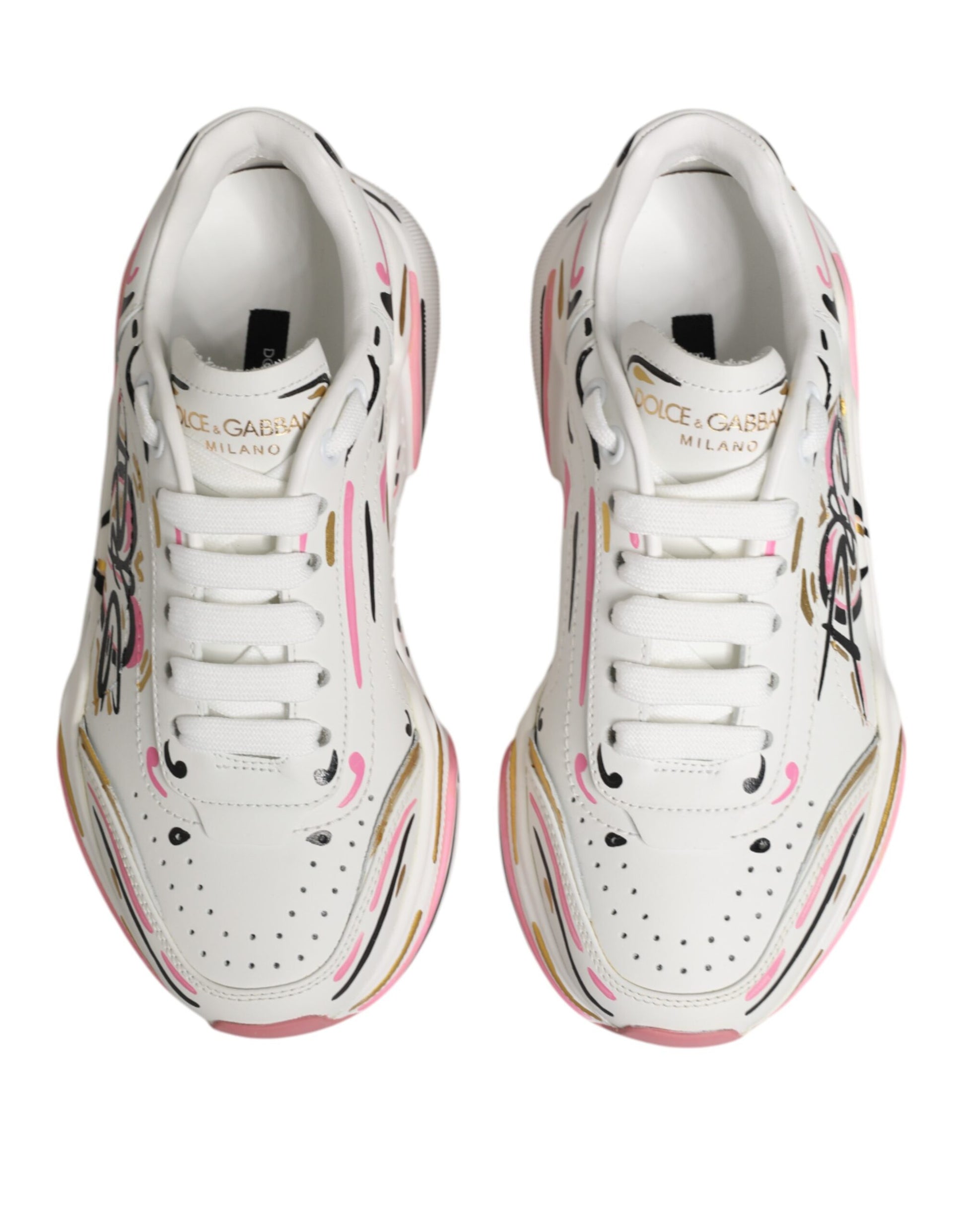A pair of multicolored hand-painted sneakers with a pink and white design