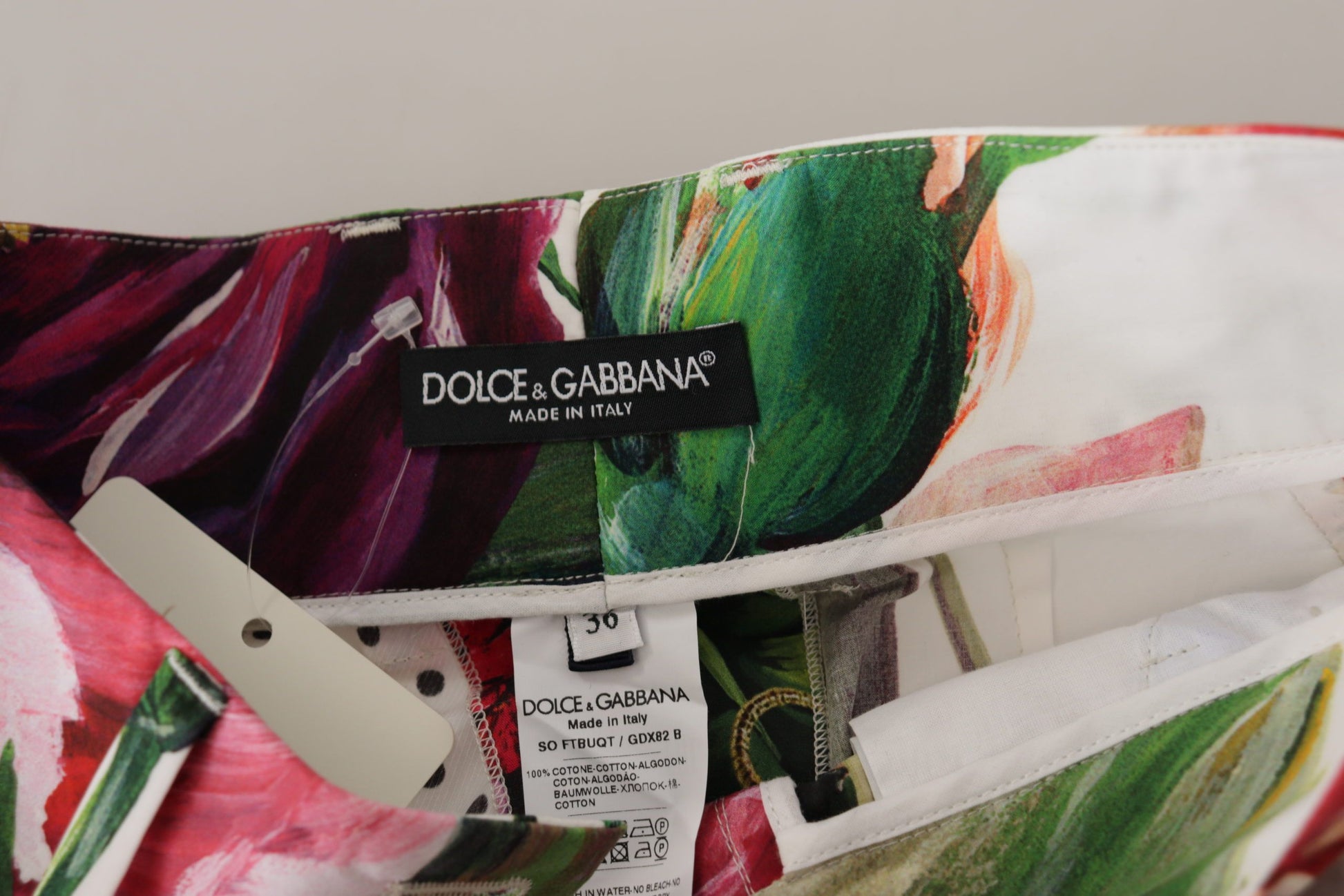 A pair of multicolored high waist shorts from Dolce & Gabbana, featuring a vibrant floral print