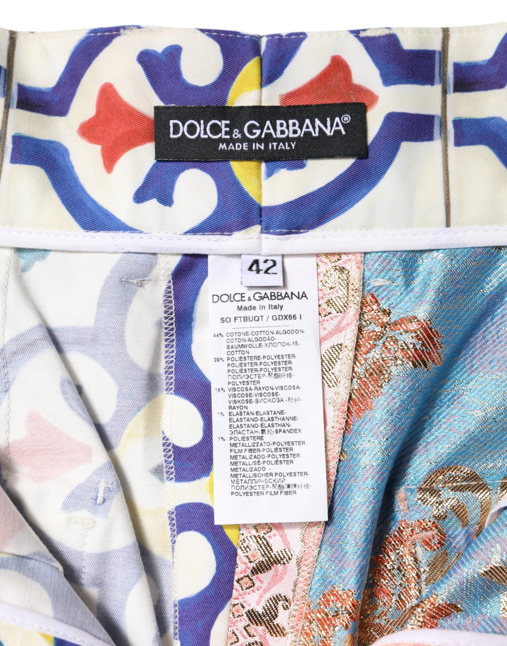 Colorful patterned fabric with a label that reads "Dolce & Gabbana