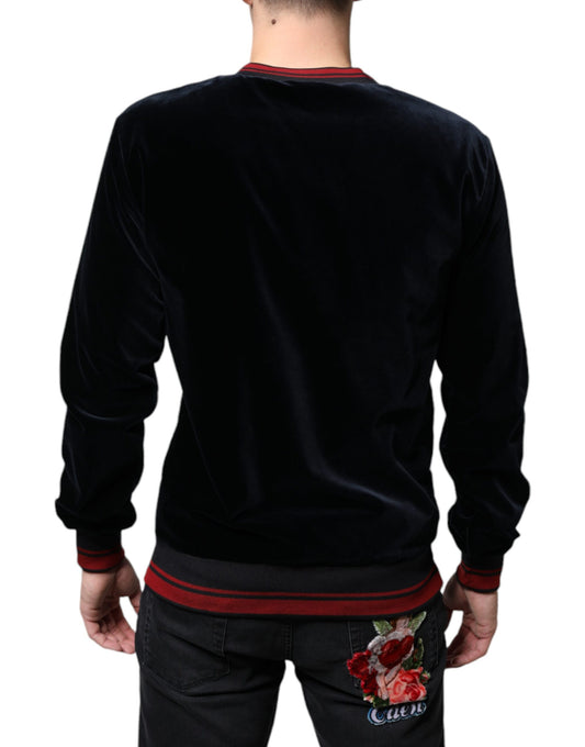 Black velvet long sleeve shirt with red trim and floral design on back