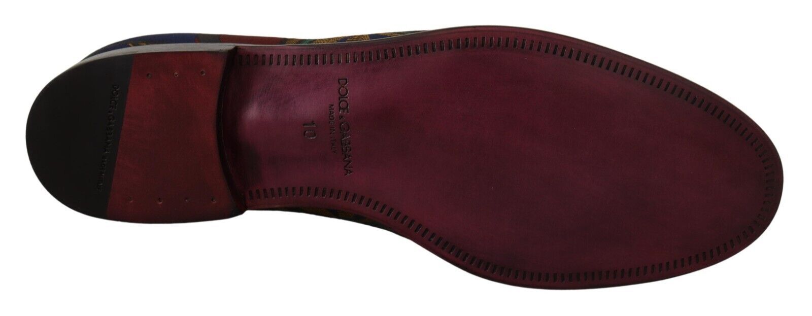 Pair of brown leather shoes with laces and a small logo on the side