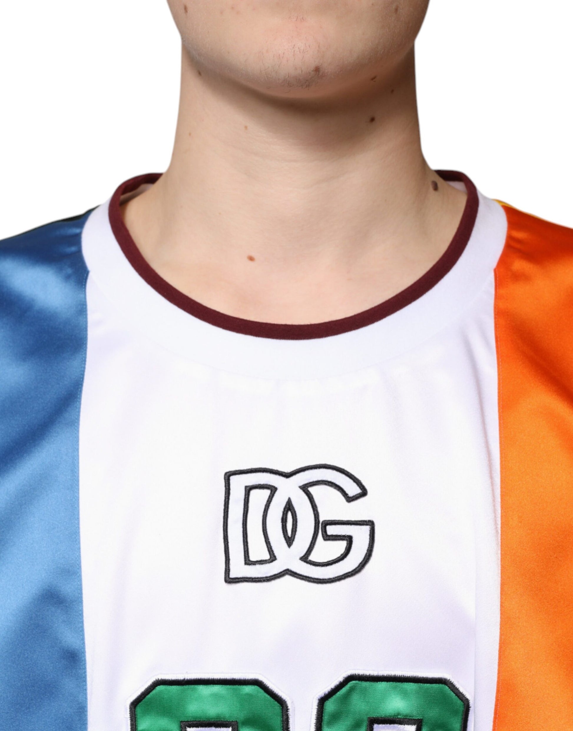 Orange, white, and blue basketball jersey with DC logo