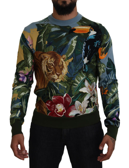 Man wearing a colorful sweater with tropical animals and plants