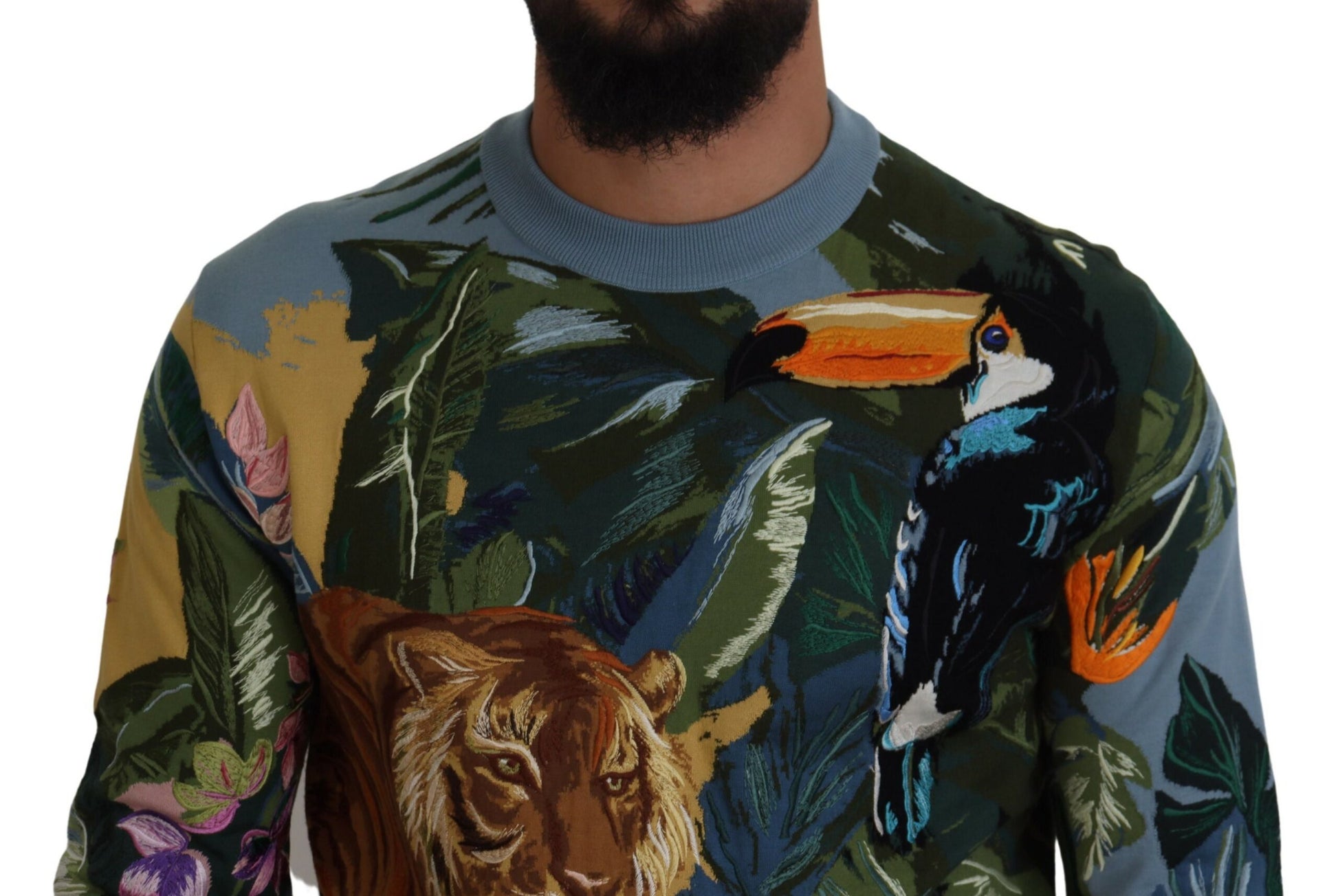 Colorful sweater with jungle animals and plants