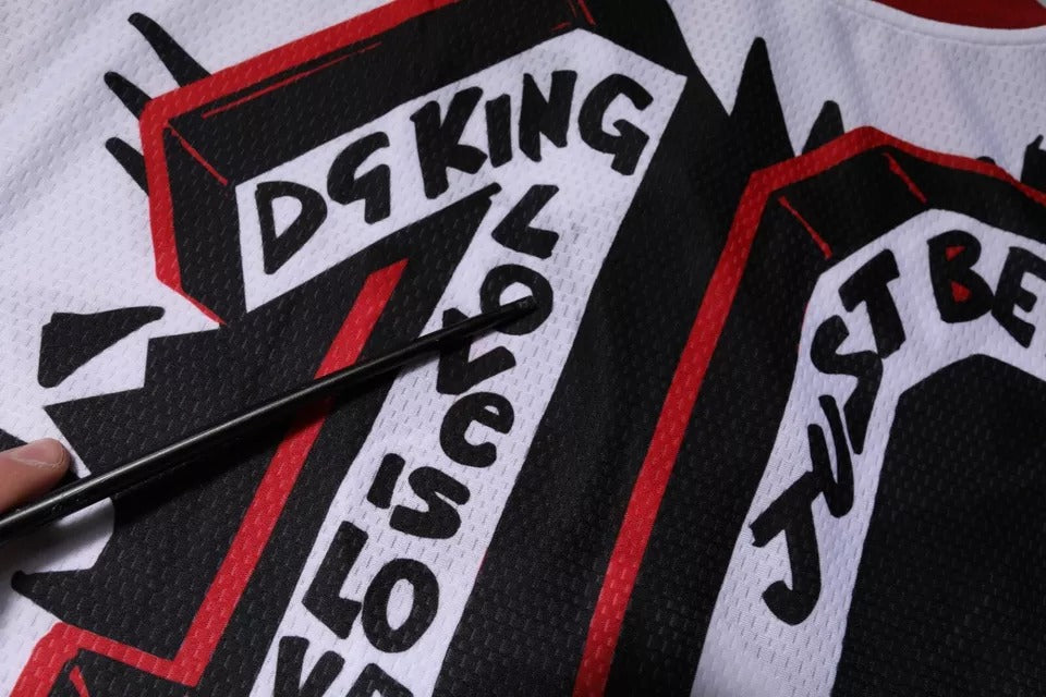 Black and white jersey with red lettering