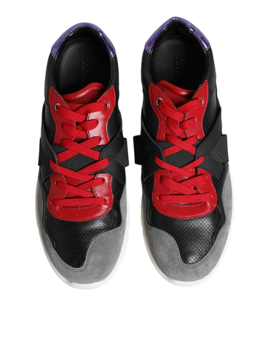 Pair of black and red sneakers with white soles