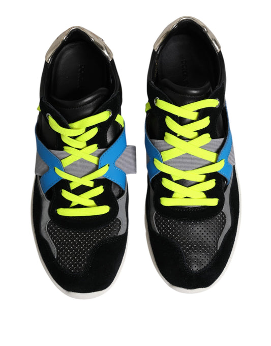 Pair of black and yellow sneakers