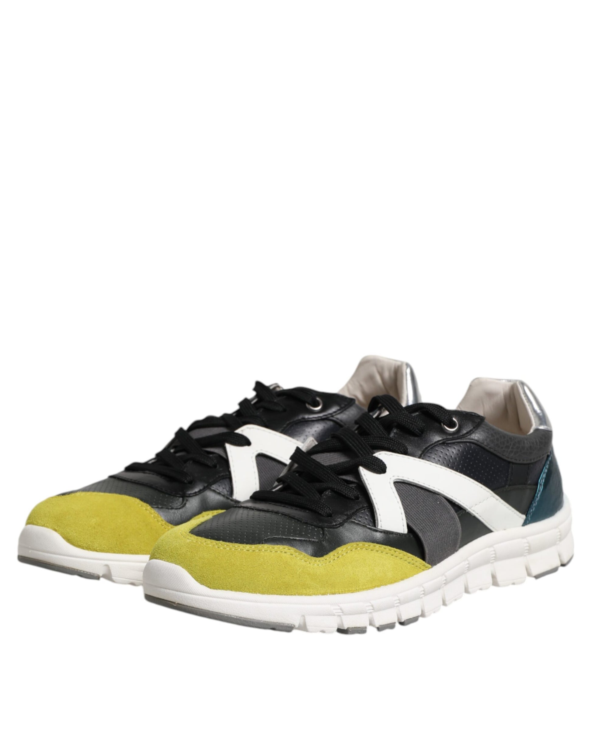 Pair of sneakers with yellow accents