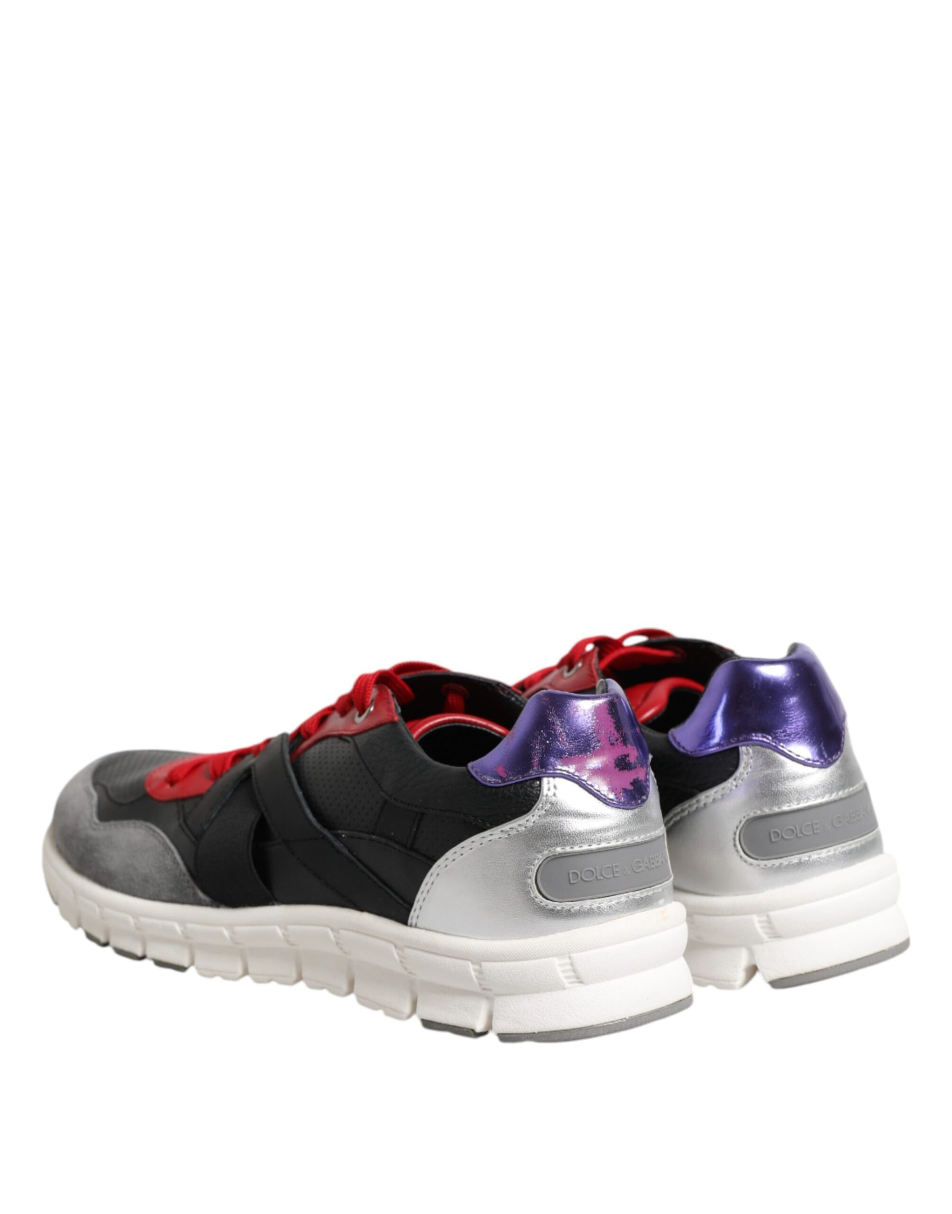 Pair of sneakers in black, red, and silver colors