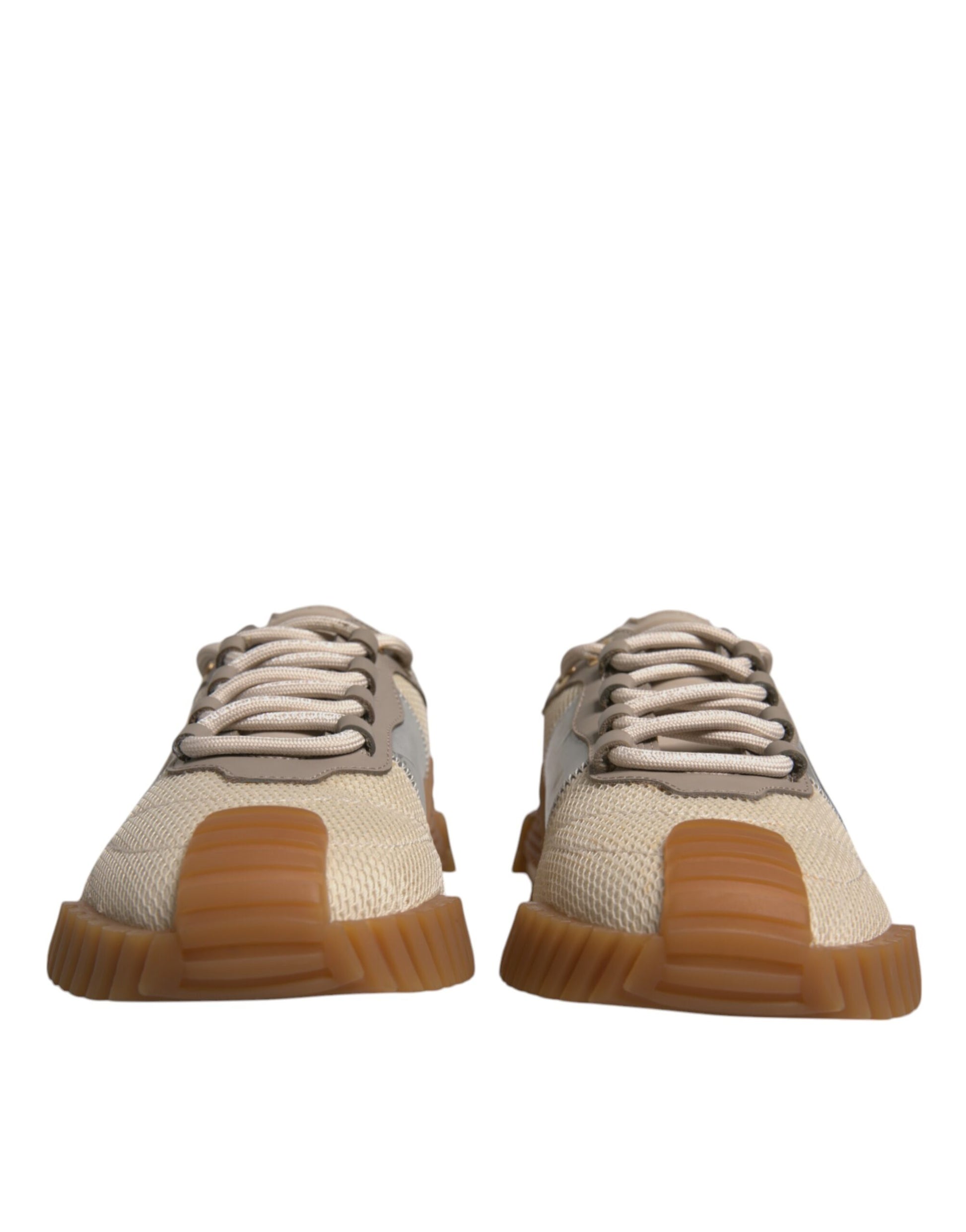 Pair of brown sneakers with white laces