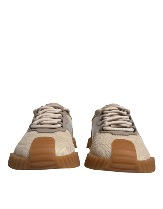 Pair of brown sneakers with white laces