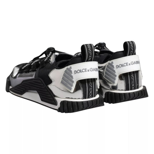 Pair of black and white sneakers with brand logo on side