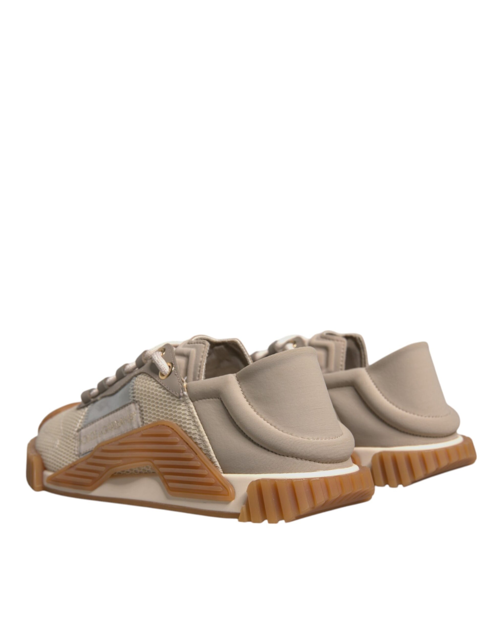 Pair of light brown athletic shoes with white soles