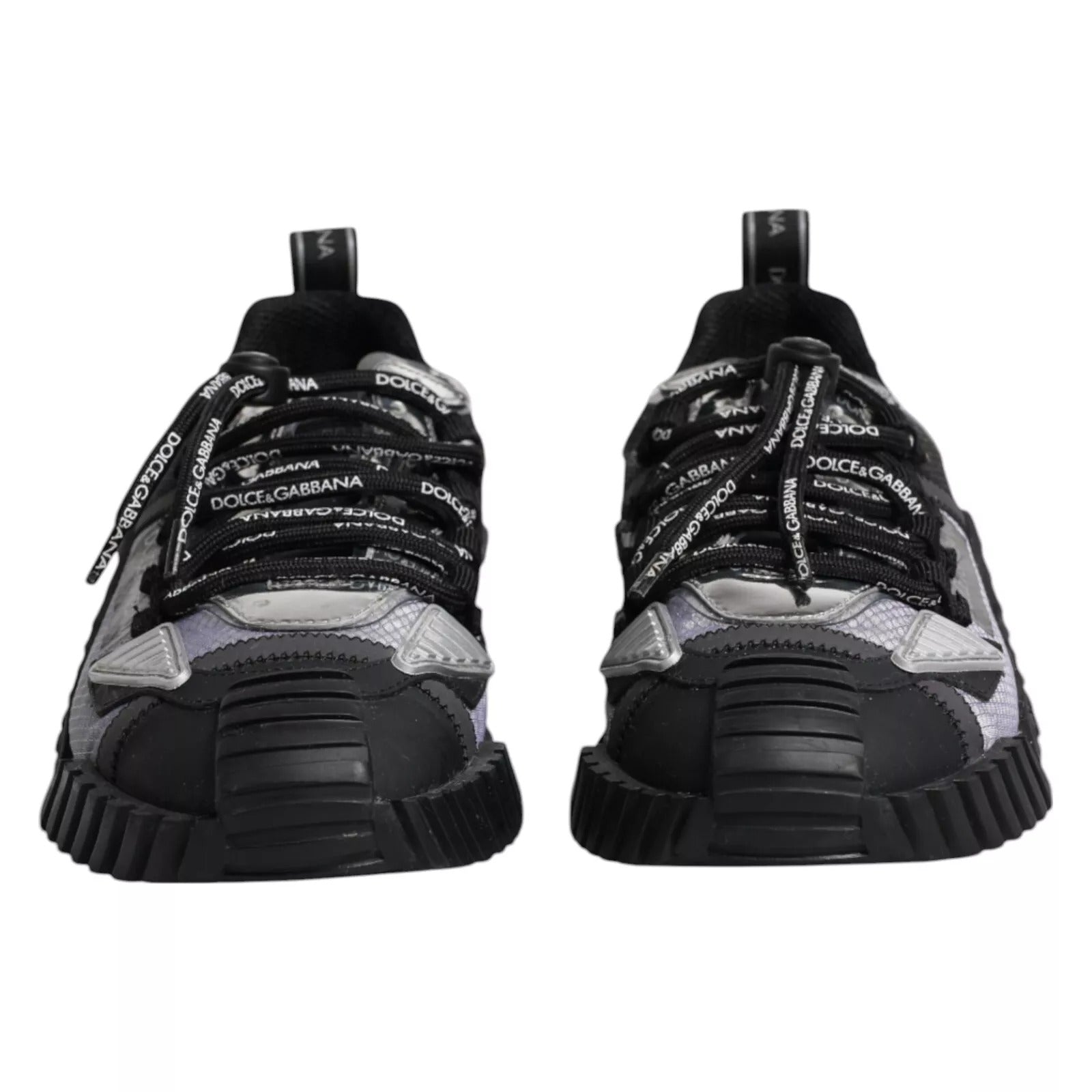 Pair of black and white sneakers with laces
