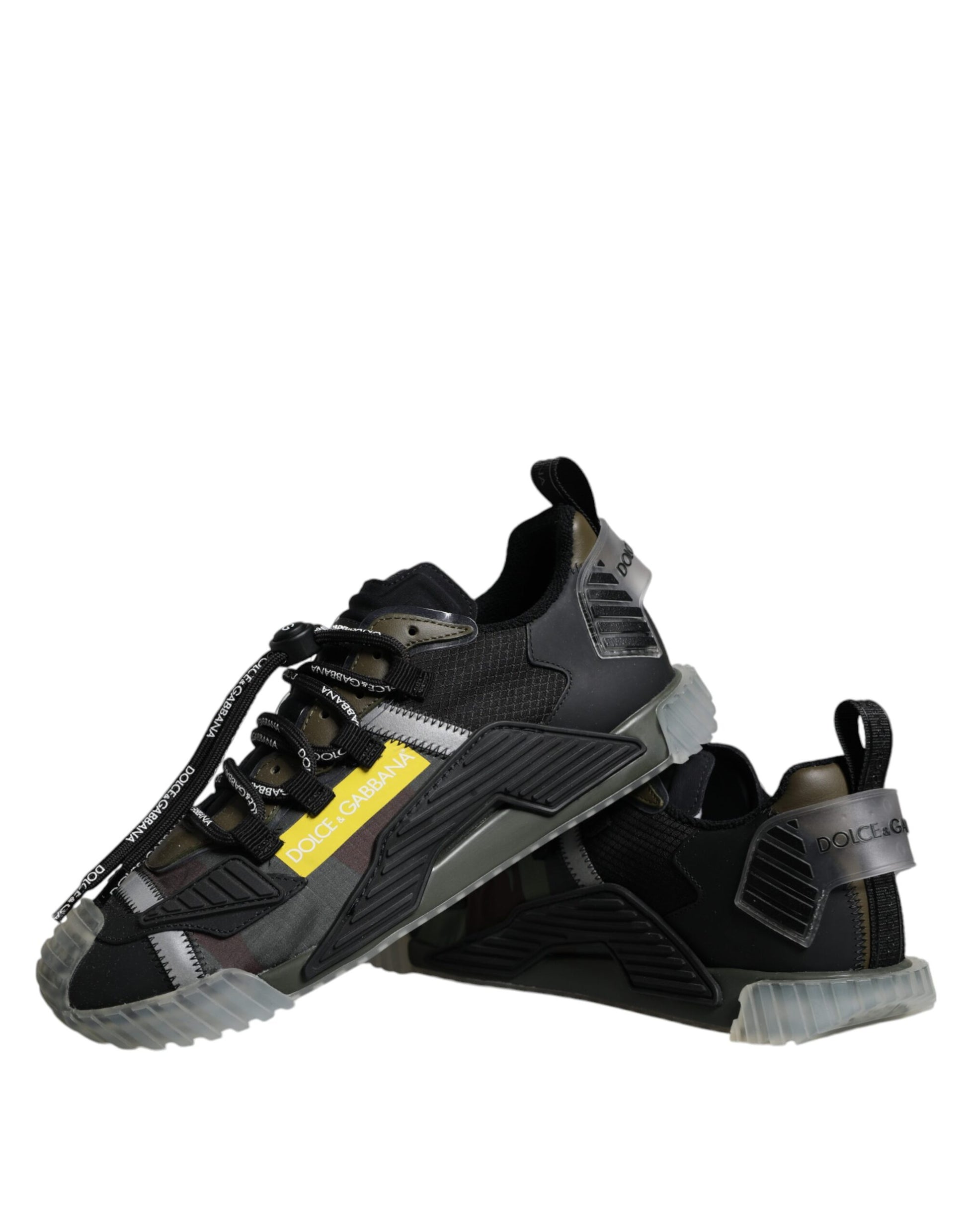 Black lace-up sneakers with yellow logo and white sole