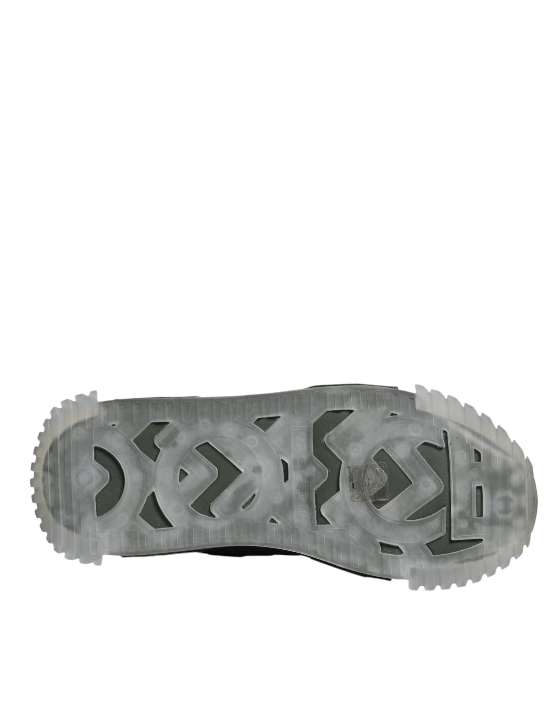 A single shoe with a lace-up design, featuring a textured sole and a patterned upper