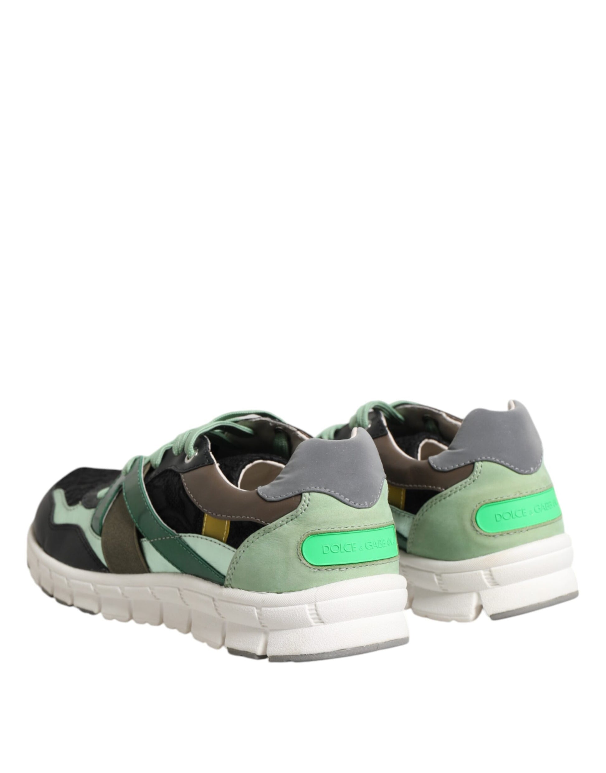 Pair of sneakers with green accents
