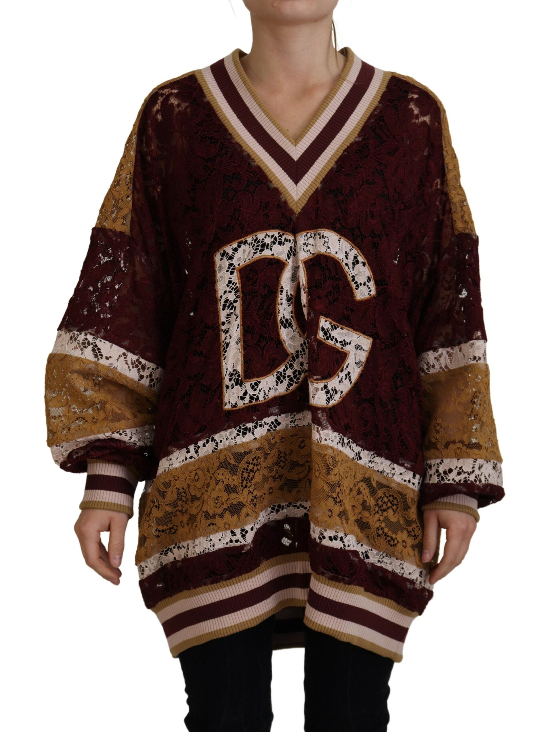 Brown sweater with red and white stripes on sleeves