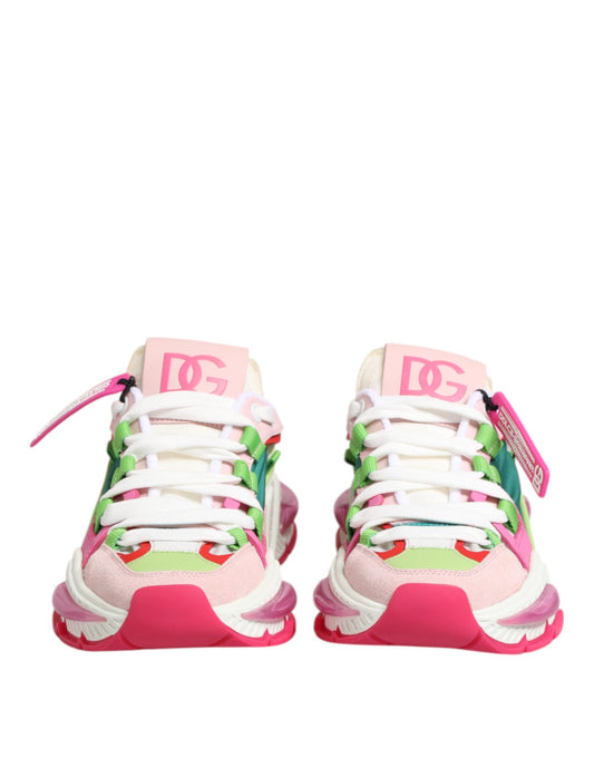 Pink, white, and green leather sneakers with multicolored laces