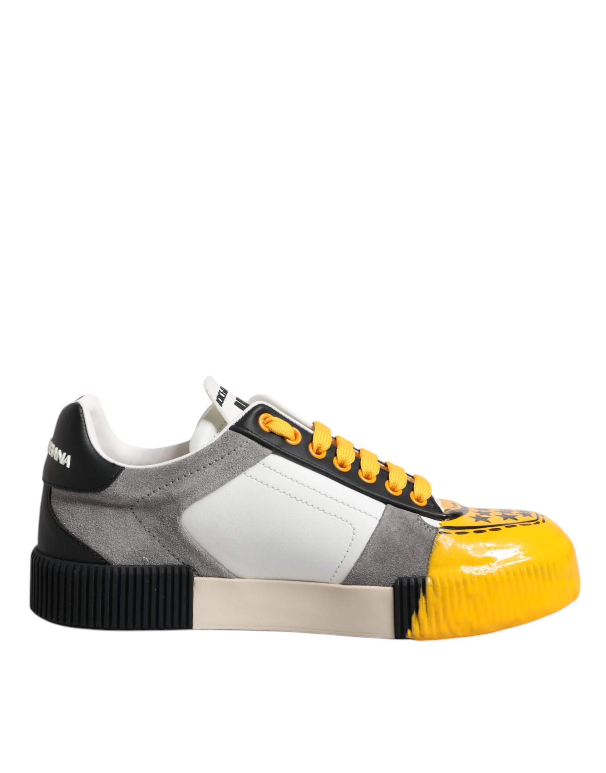 A single sneaker with a low top design. It features a combination of gray and yellow colors on the upper part, with white