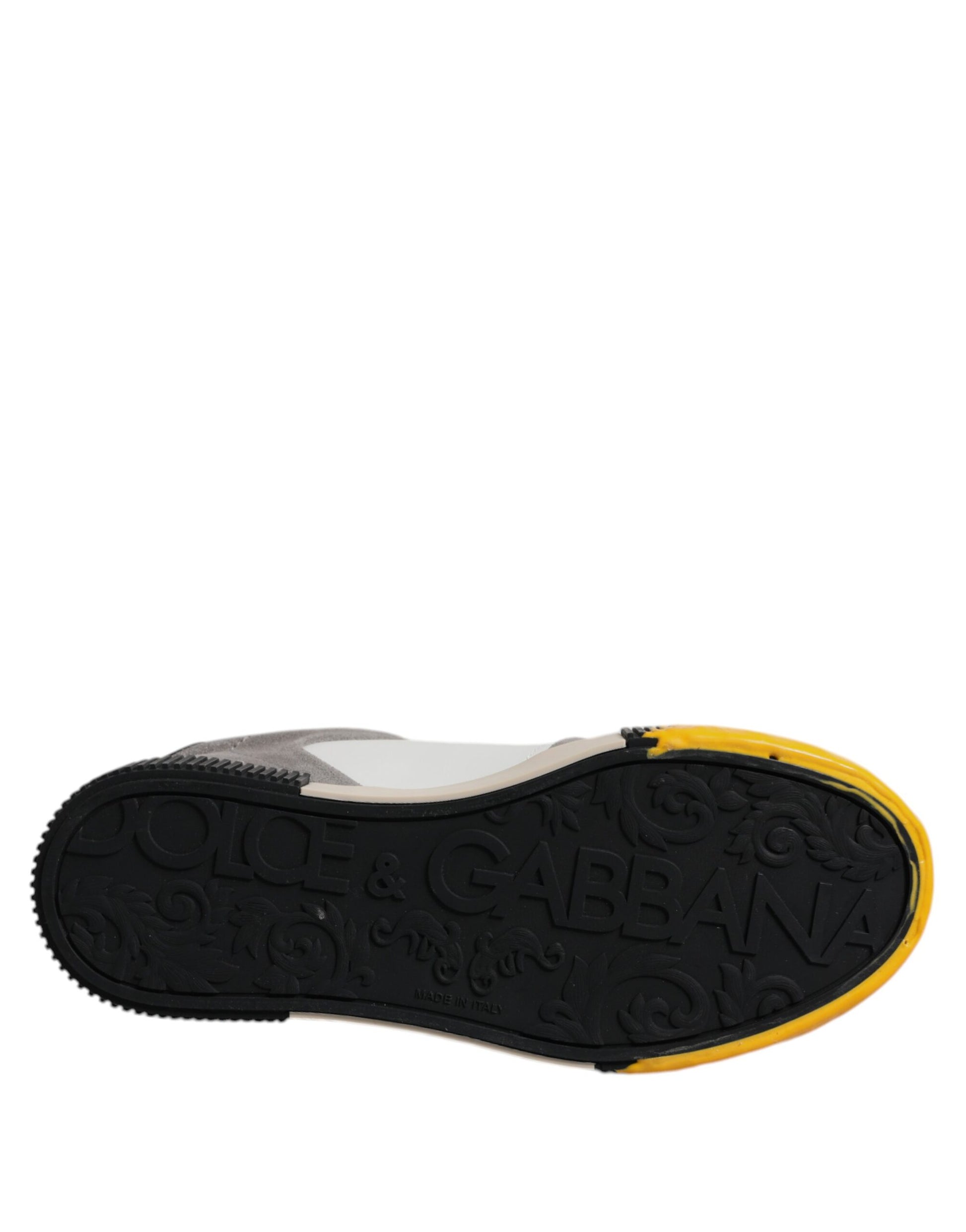 Black and yellow shoe with text on sole