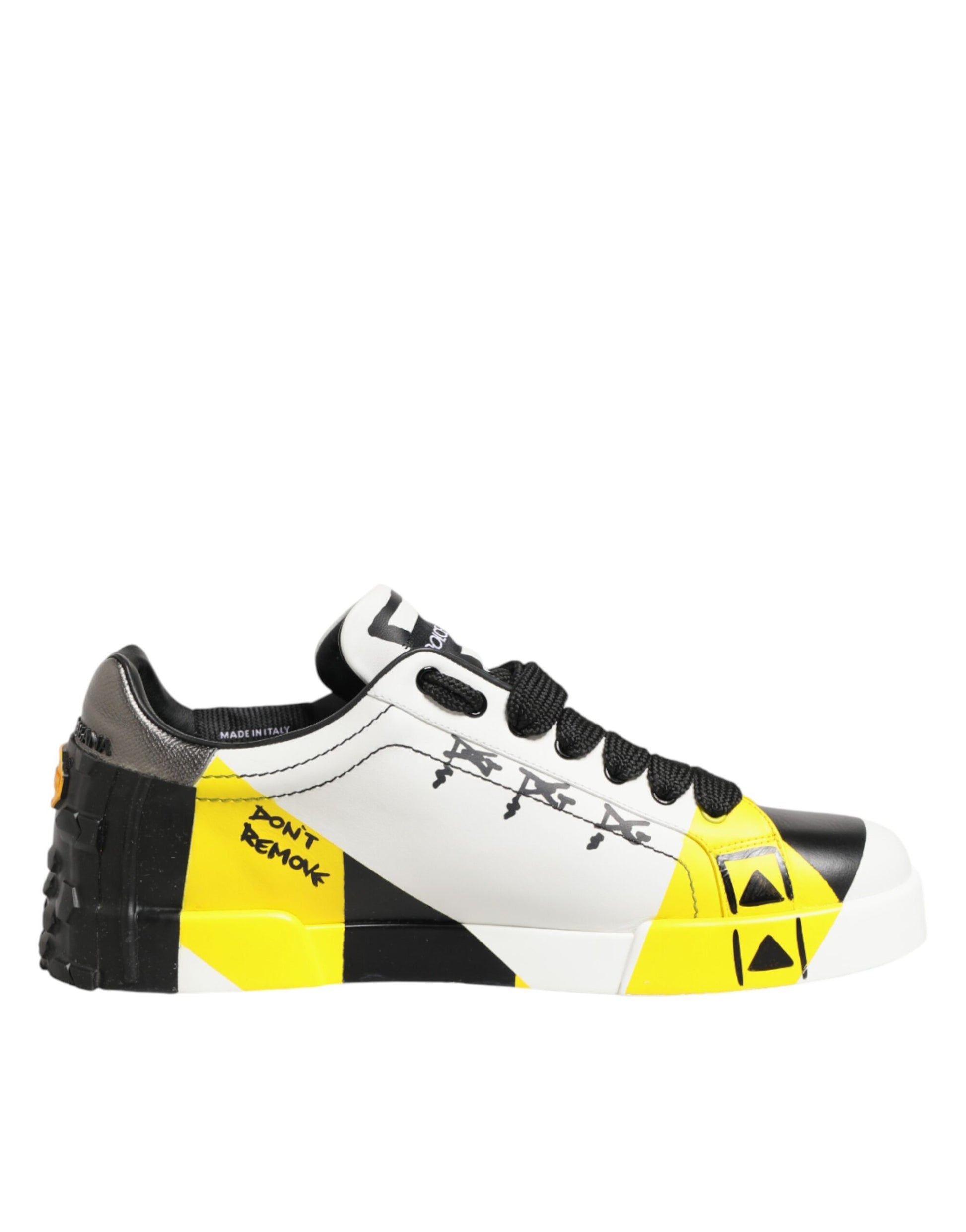 Yellow and black sneaker with white sole