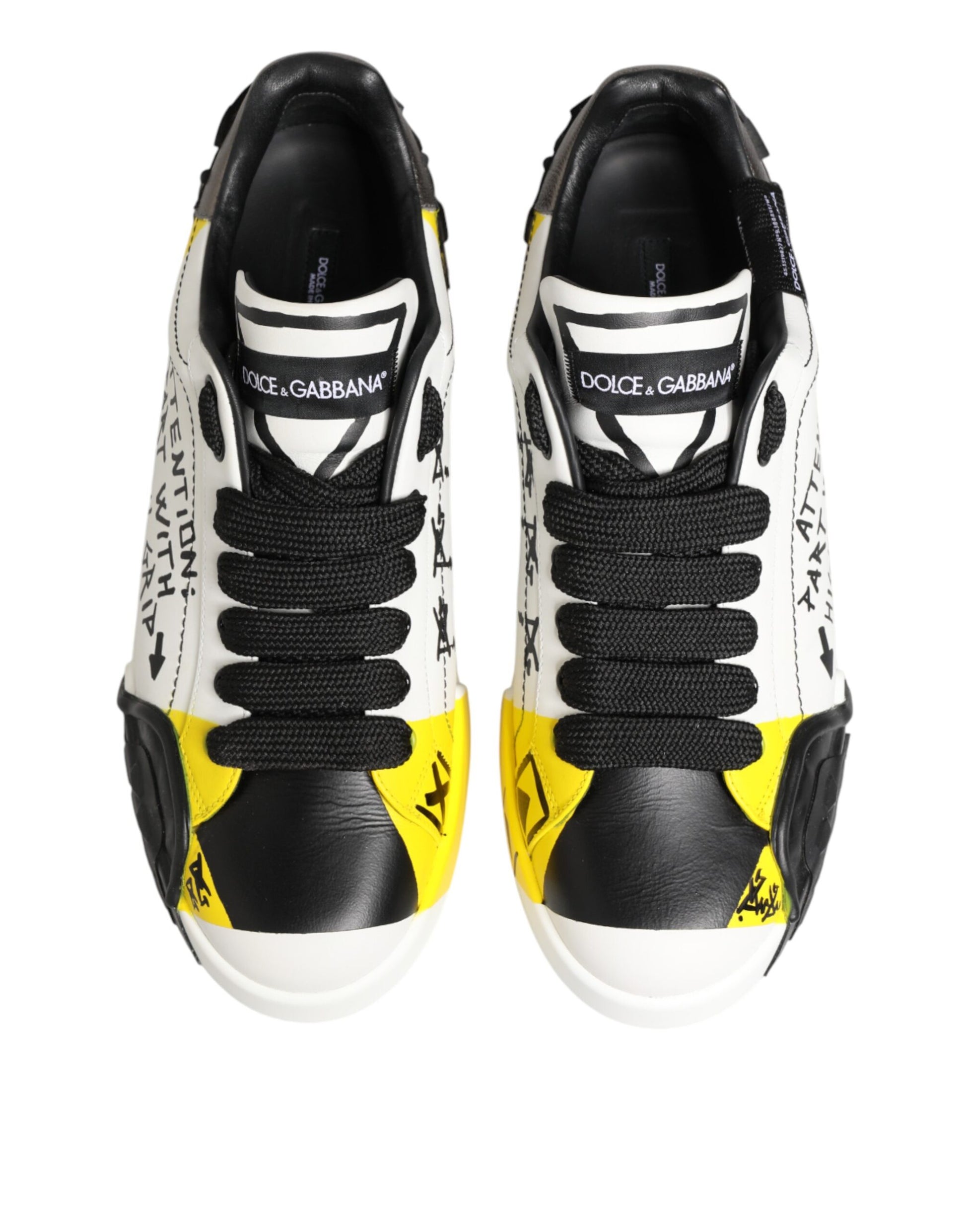 Pair of yellow and black sneakers