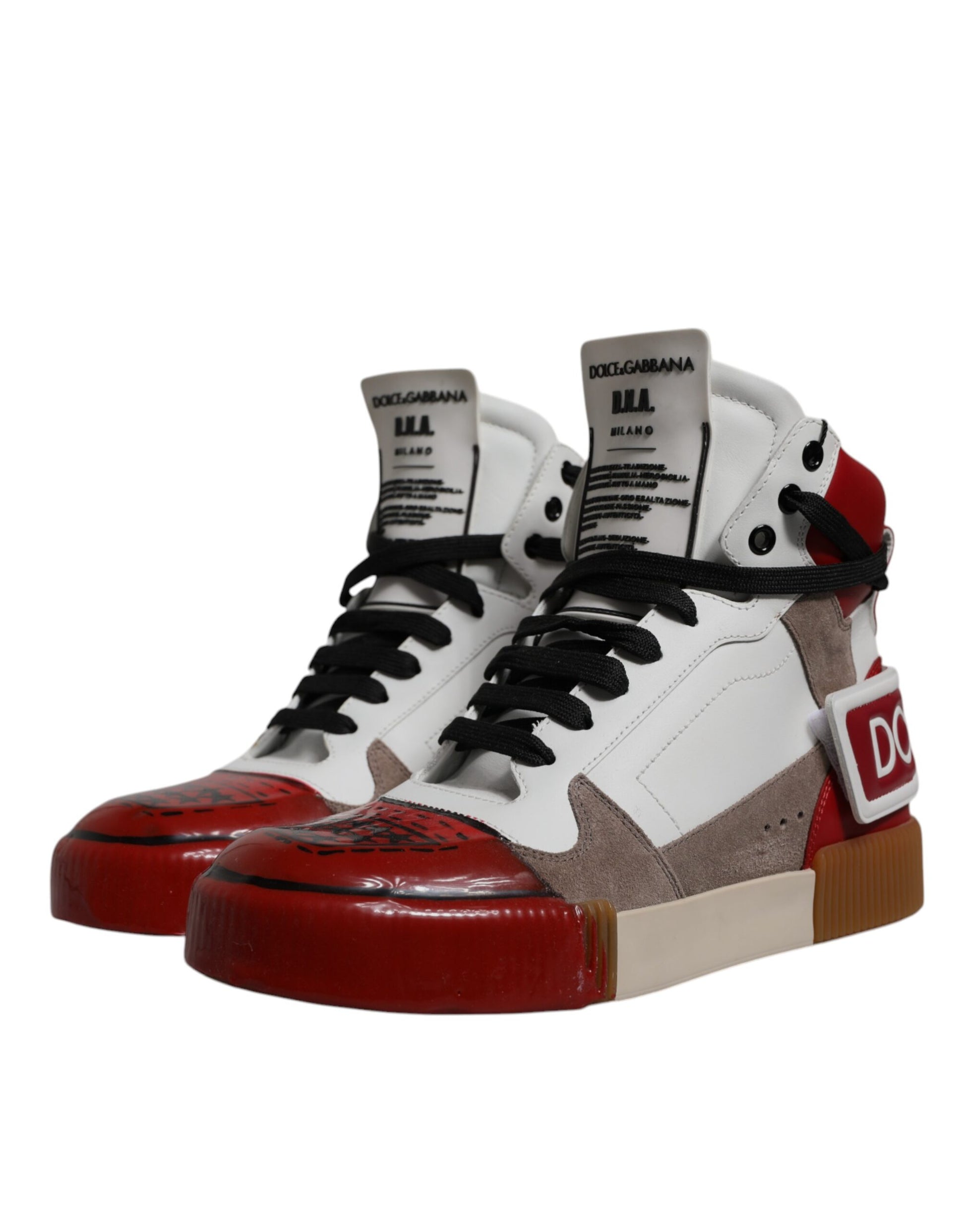 Pair of high top sneakers with red and white laces, black soles, and a design on the side