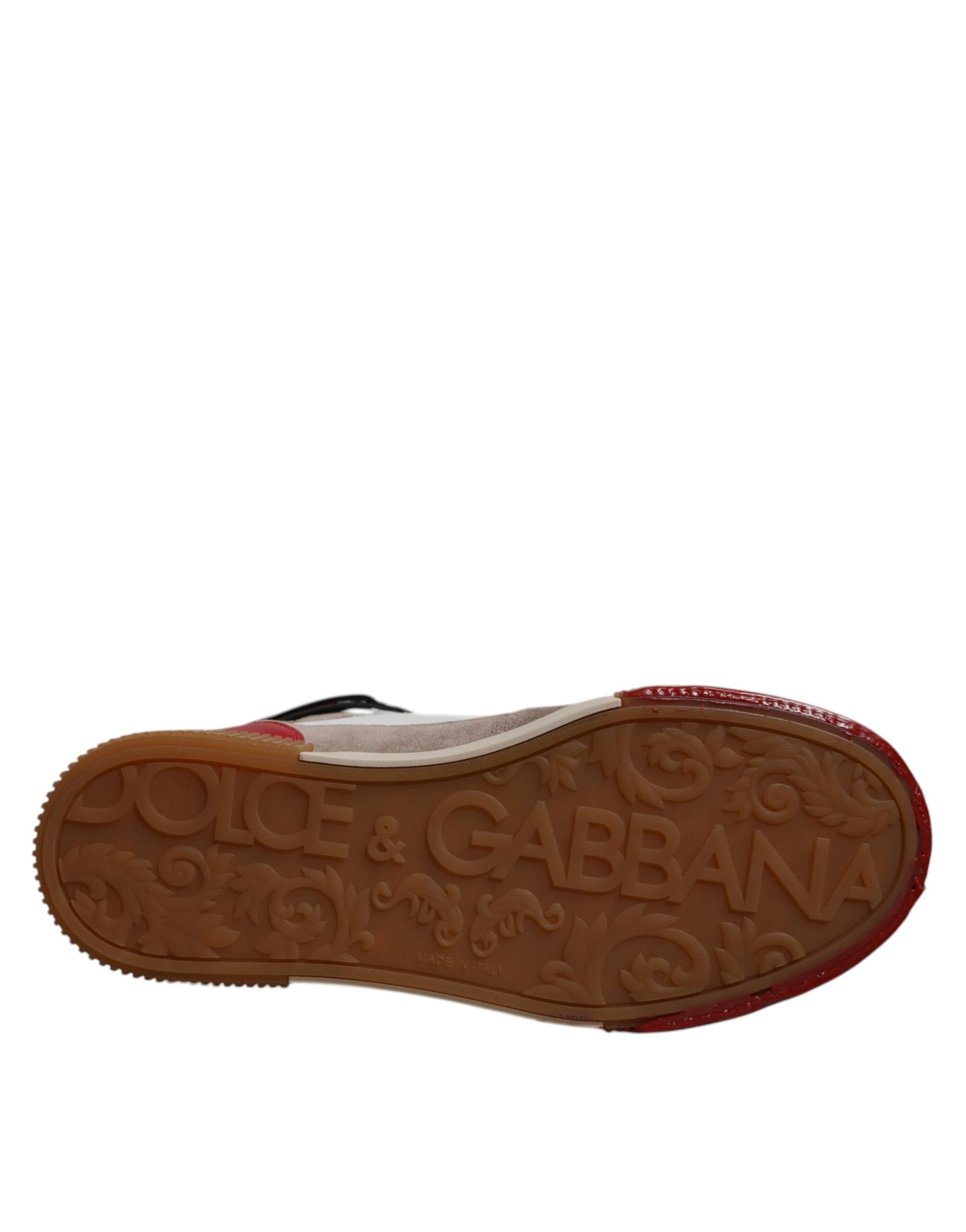Brown shoe with red laces and white sole