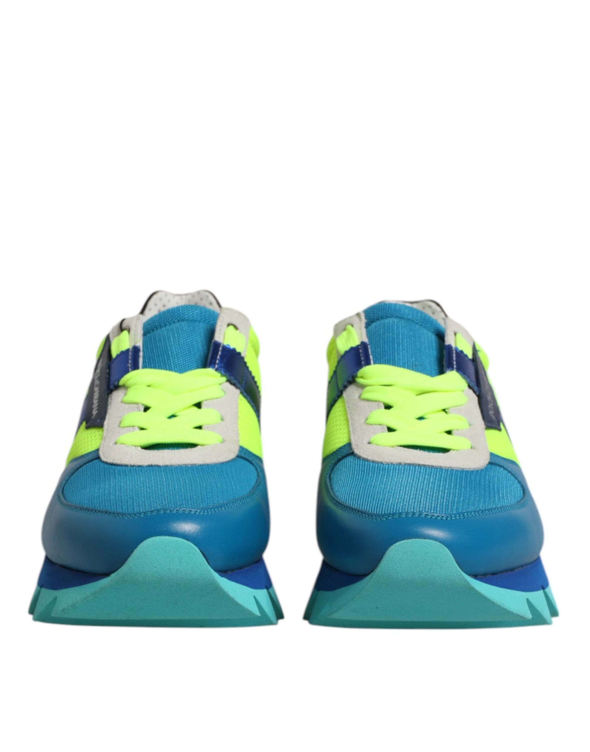 Pair of blue and yellow sneakers with white laces