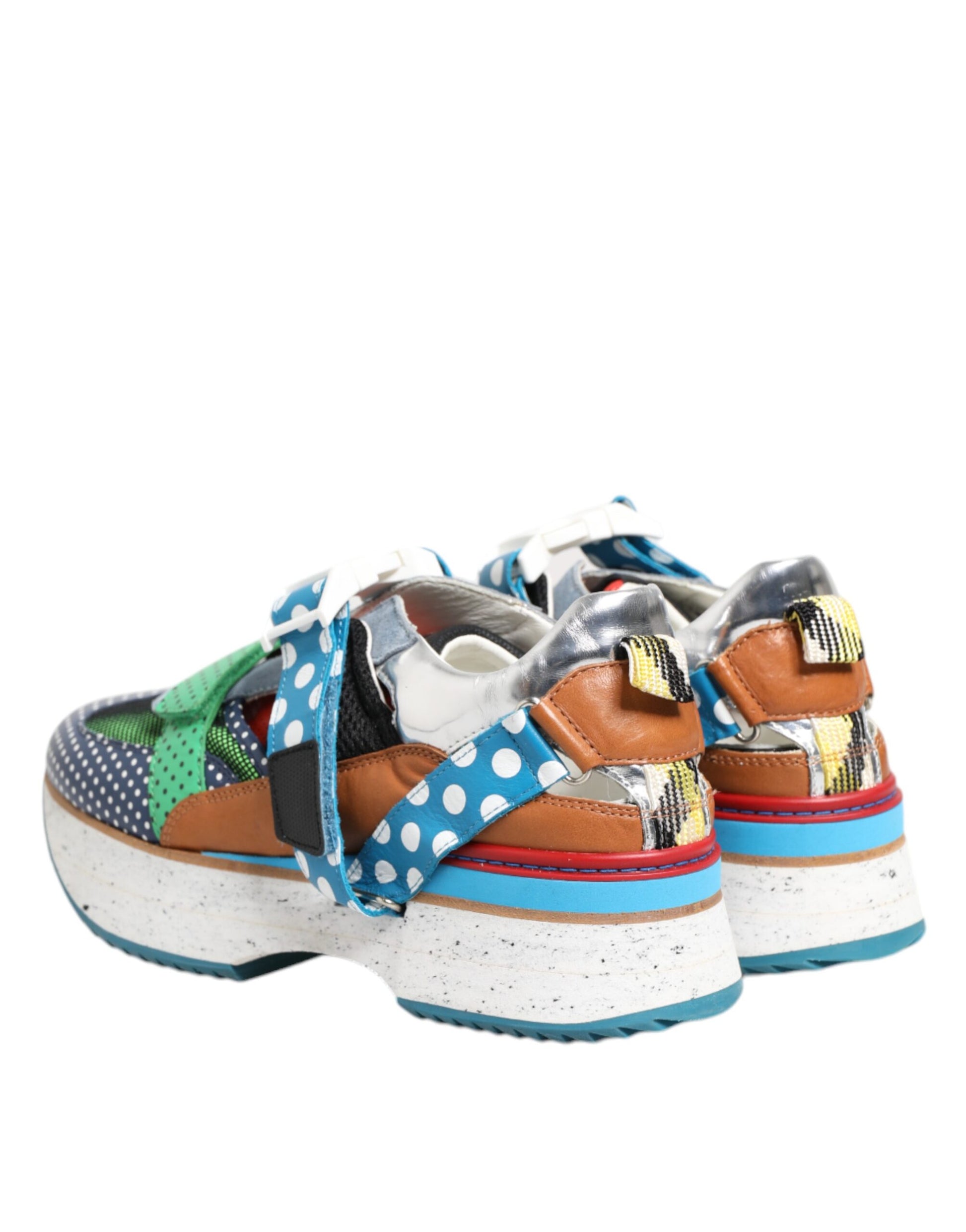 Pair of colorful sneakers with laces and polka dots